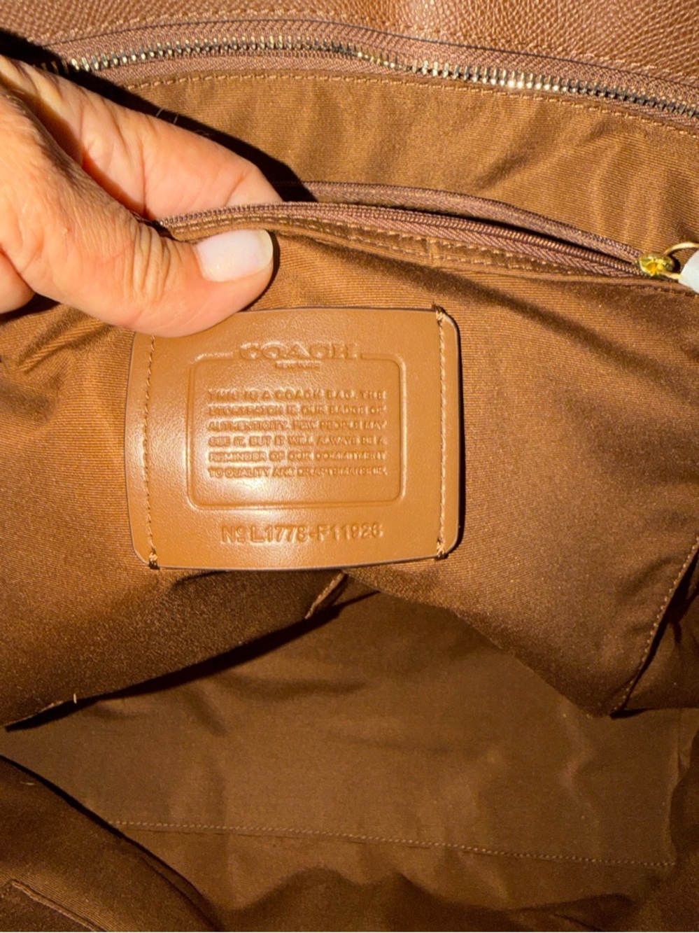 Coach City Zip Tote in the color Saddle Brown. - Picture 4 of 5